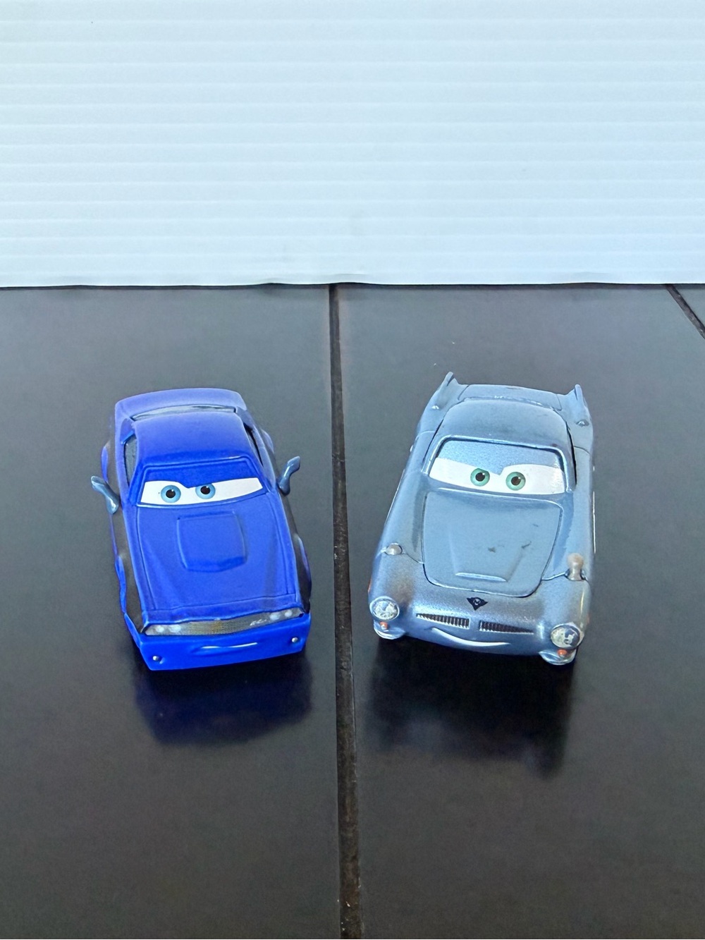 Disney Pixar Cars 2 Rod Torque Redline and Finn McMissile 1:55 diecast
